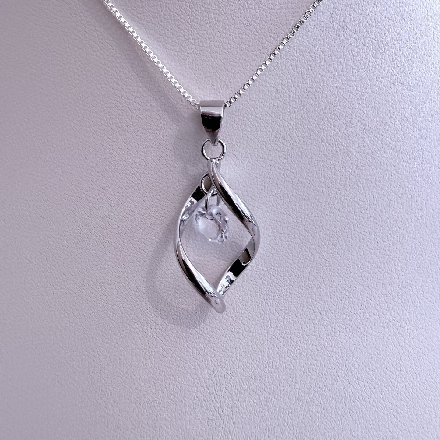 serenity-swirl-crystal-pendant-on-white-background