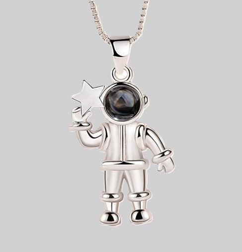 silver opal astronaut pendant