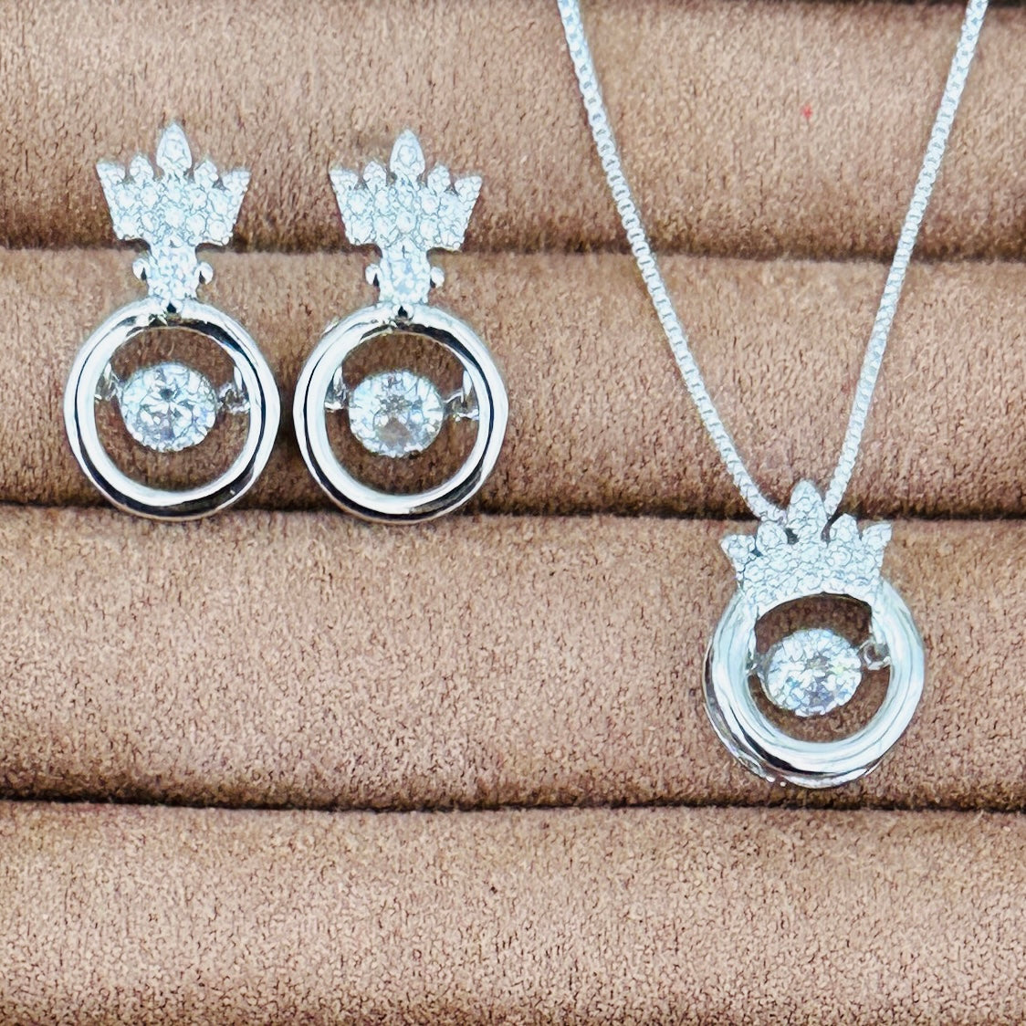 Dancing crystal crown pendant on silver box chain with matching stud earrings