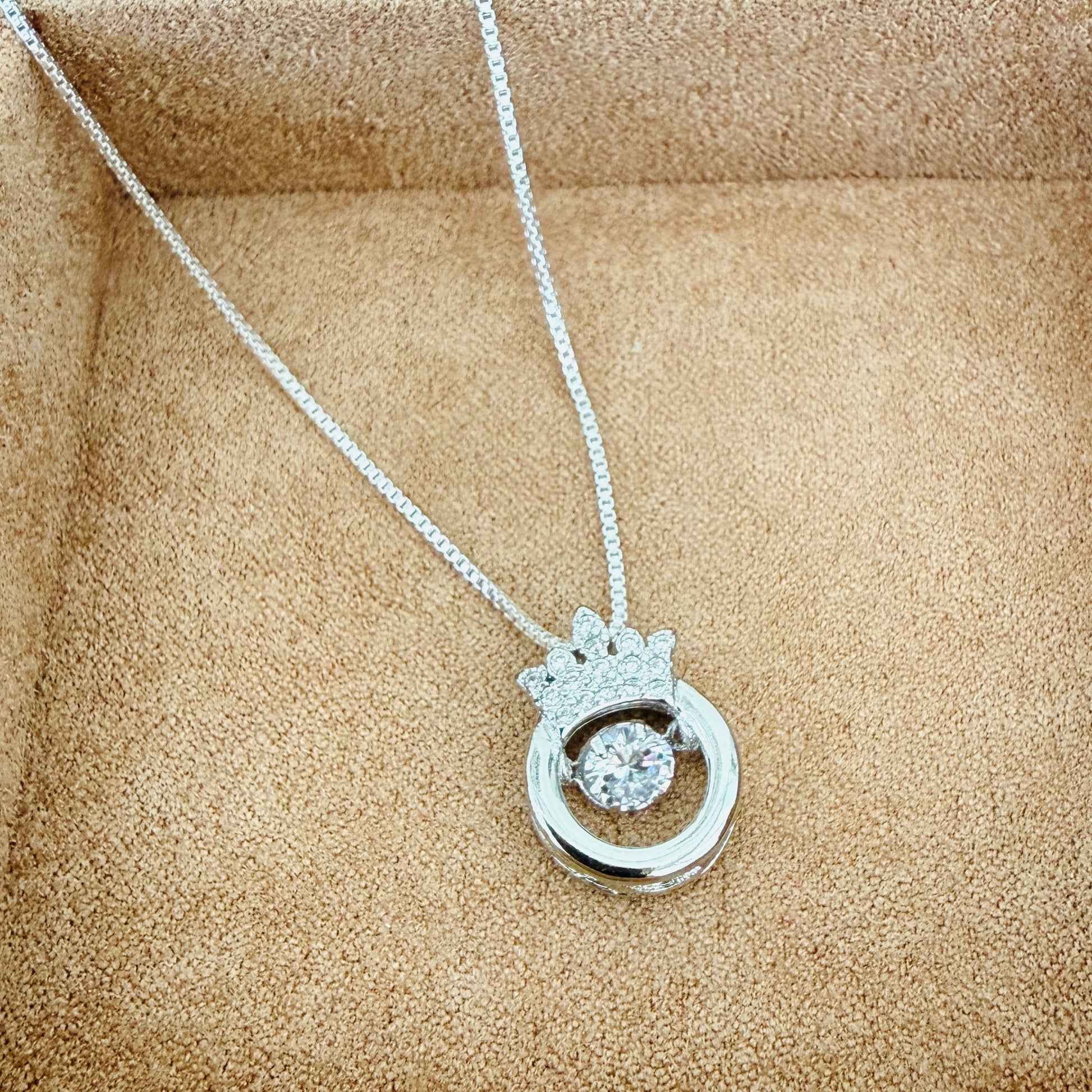 Crystal crown pendant on silver box chain