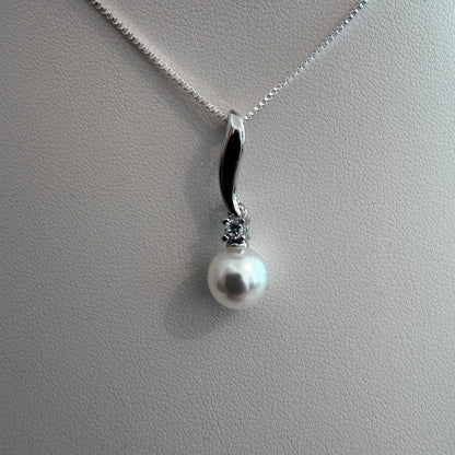 Grace Pearl Pendant necklace on silver box chain on white background