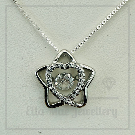 Star shaped pendant with crystal inner heart and dancing inner crystal