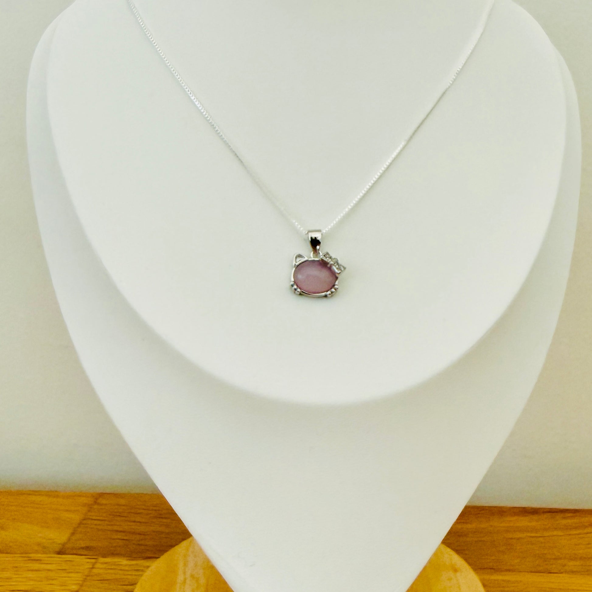 Cute Kitty necklace with a pink opal face and diamante box