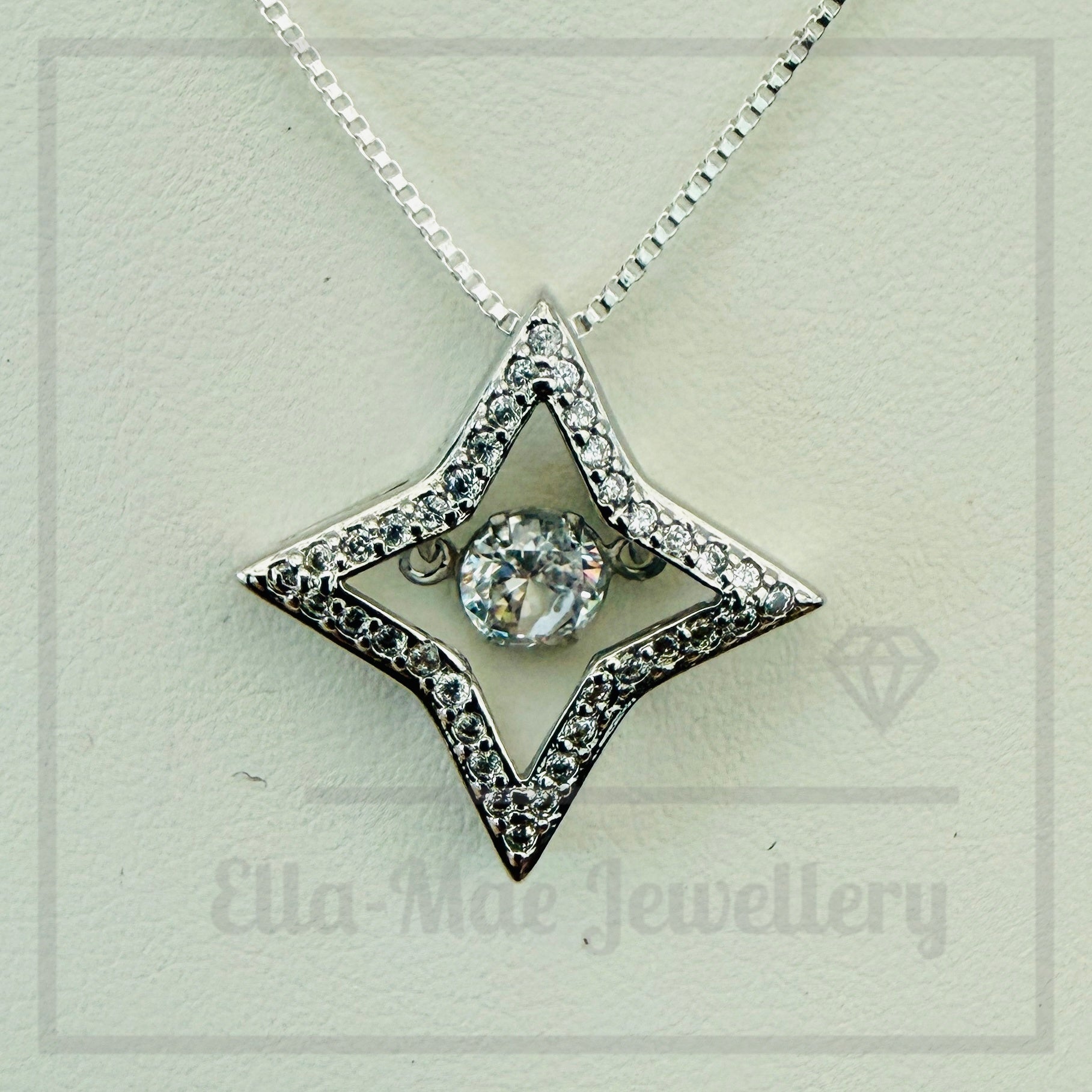 Dancing Crystal Four-Pointed Star Pendant Necklace
