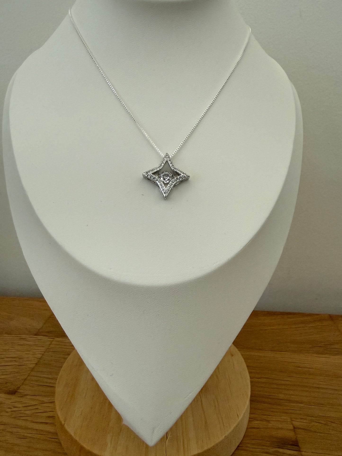 Dancing Crystal Four-Pointed Star Pendant 