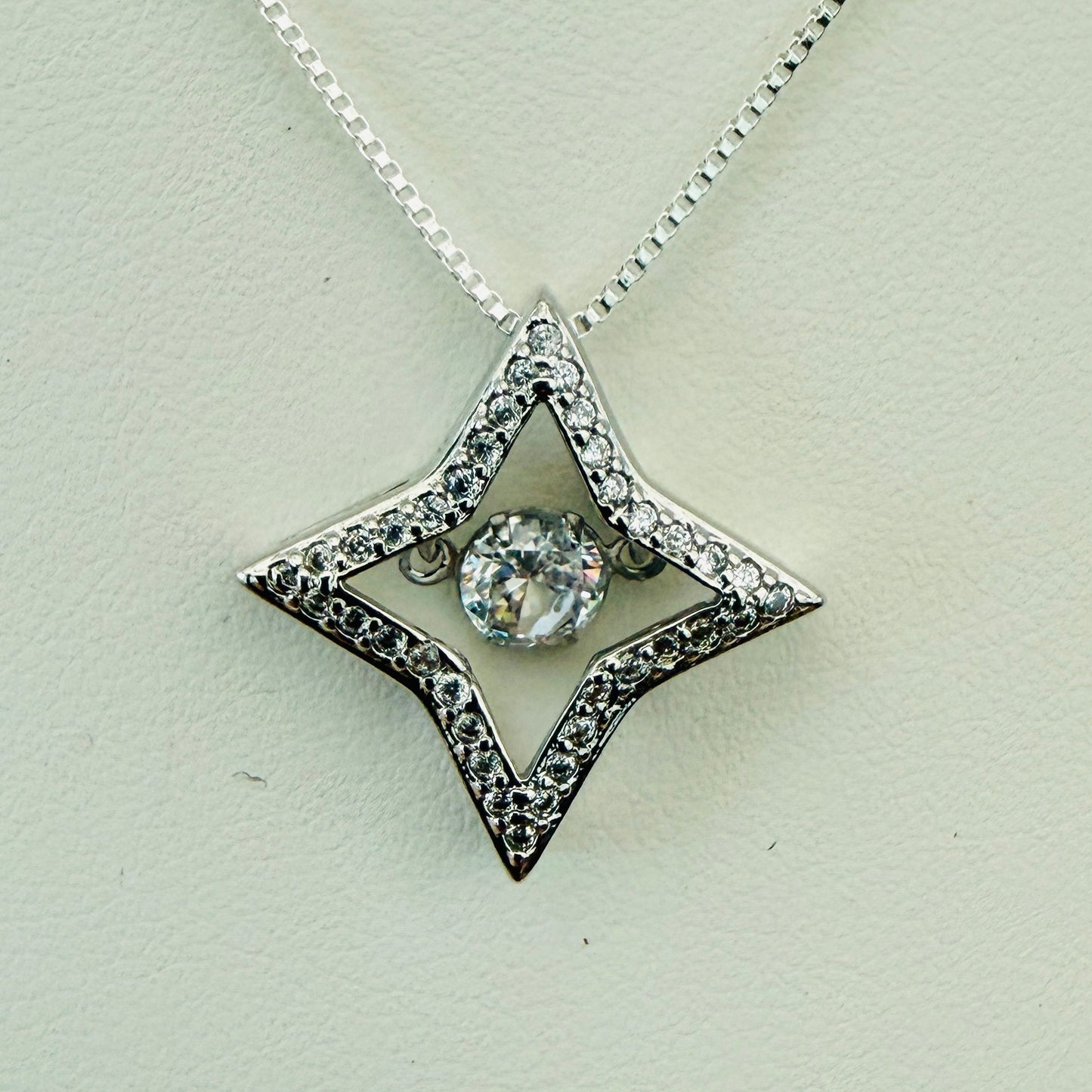 Dancing Crystal Four-Pointed Silver Star Necklace