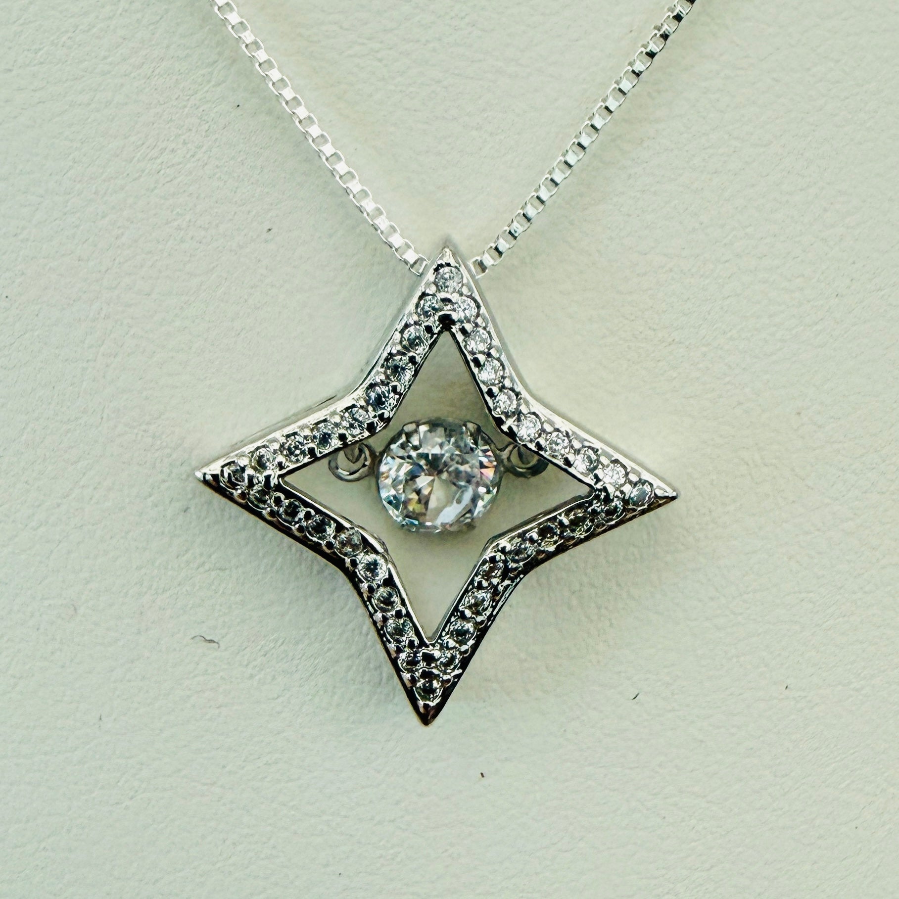 Dancing Crystal Four-Pointed Silver Star Necklace