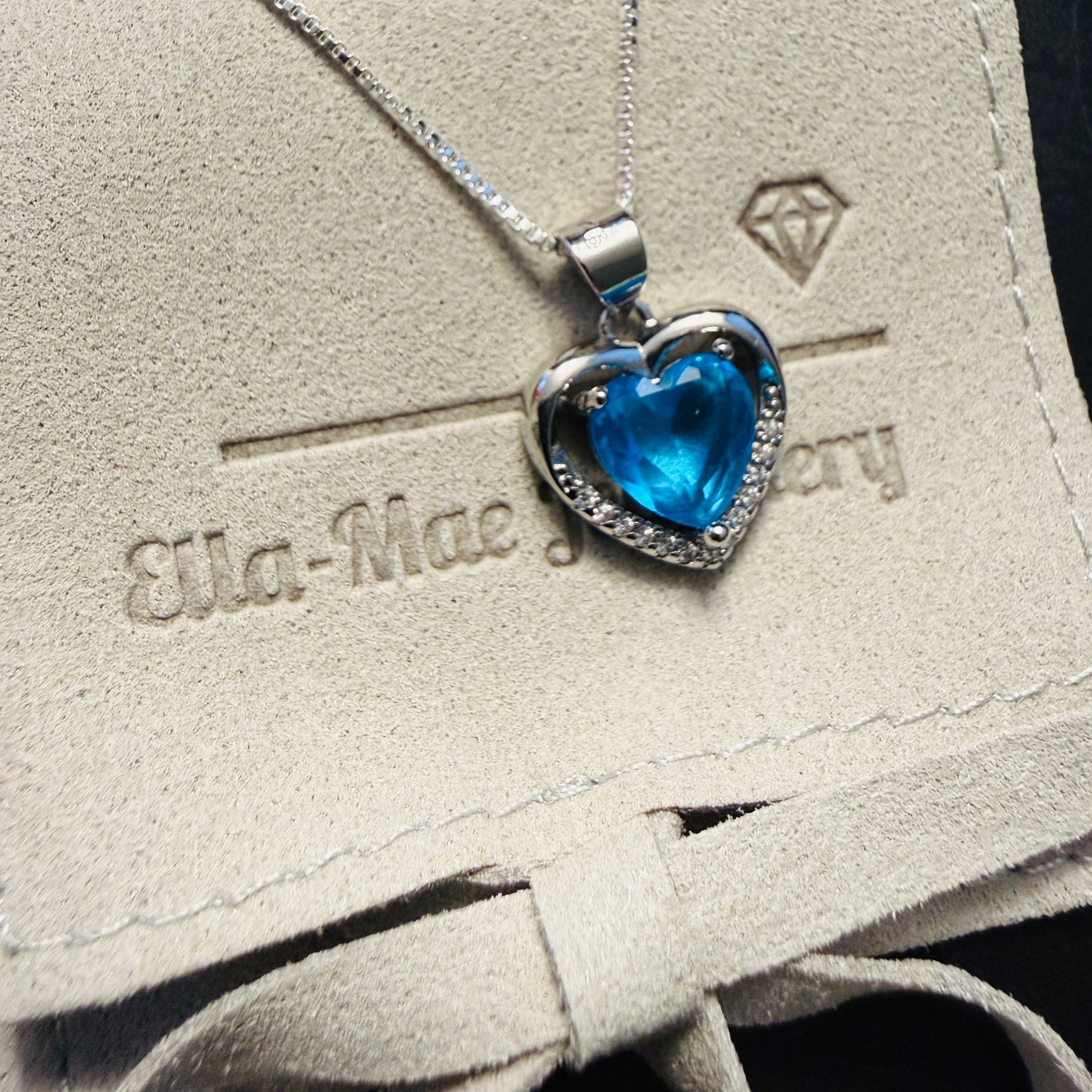 Azure blue crystal pendant necklace on box chain with Ella-Mae Jewellery gift pouch