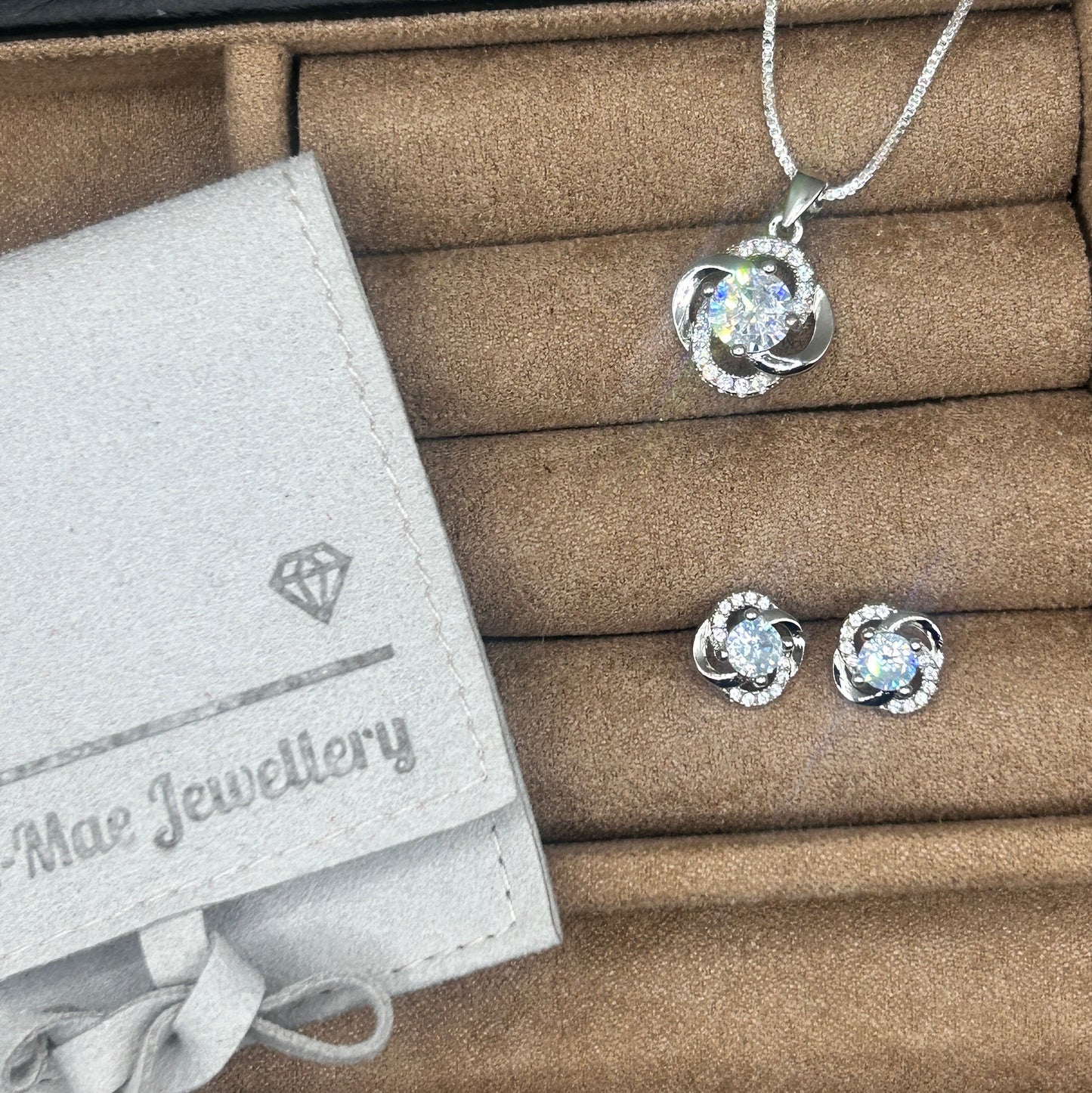 crystal swirl cubic zirconia stud earrings and necklace