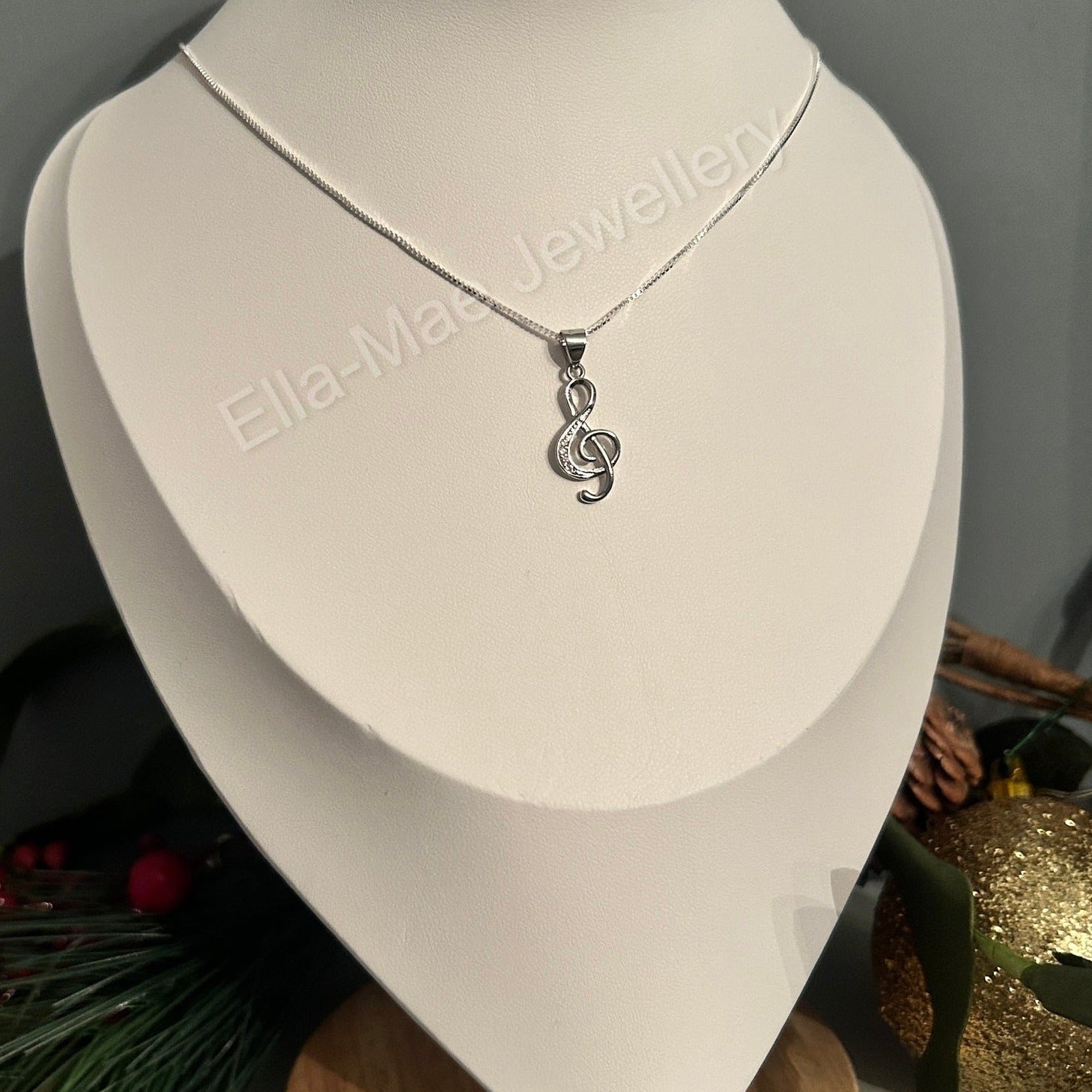 silver musical note necklace