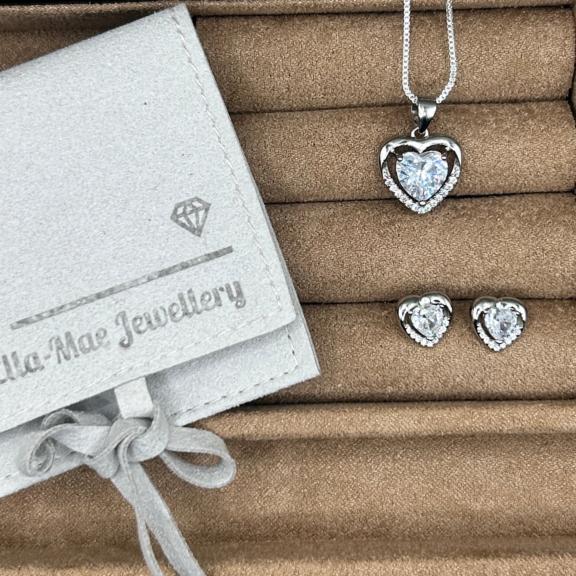 white crystal heart pendant and earrings