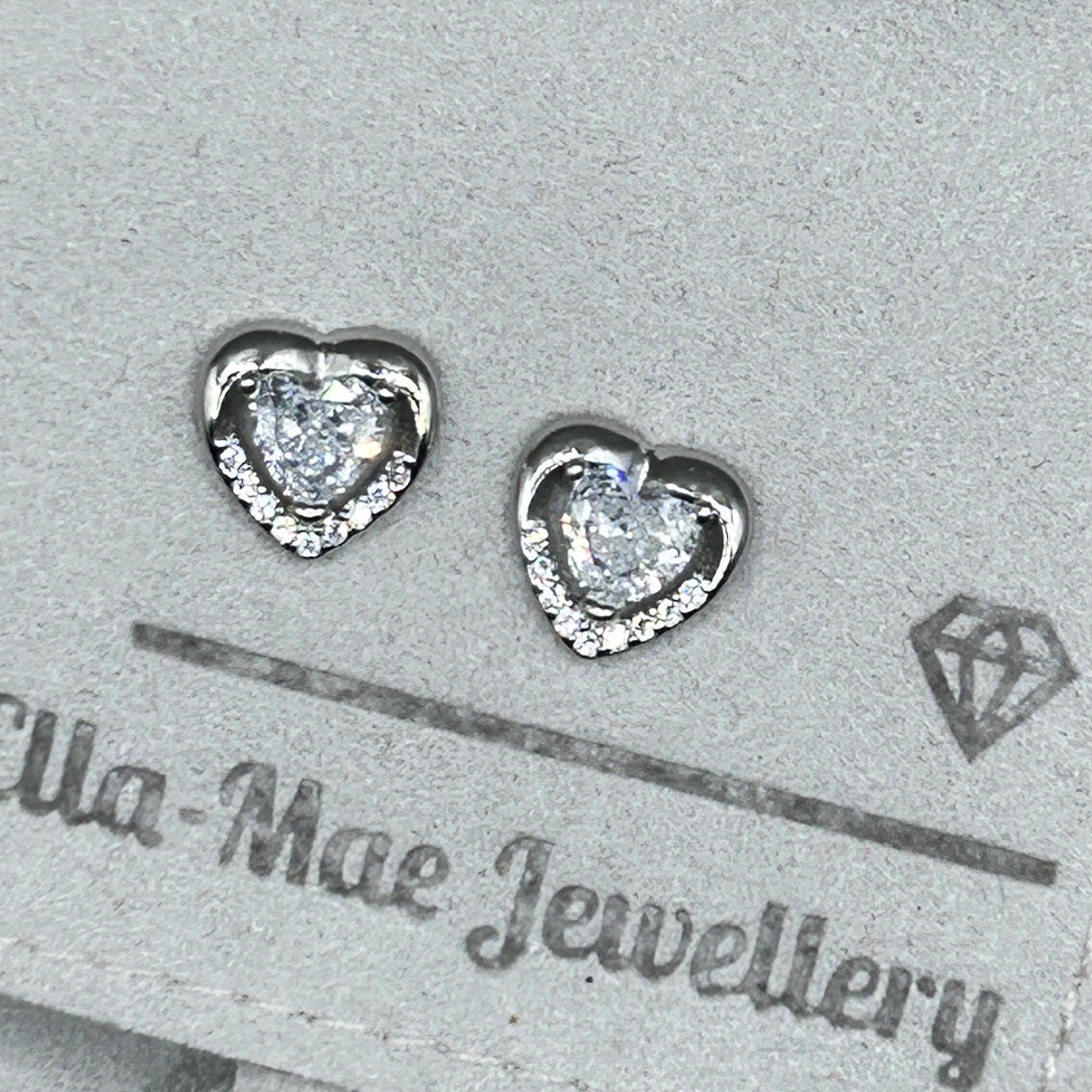 white crystal heart stud earrings