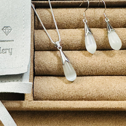 white moonstone drop pendant silver necklace and dangling earrings